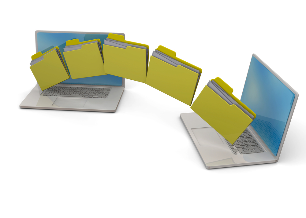 Przepływ teczek z dokumentami pomiędzy dwoma laptopami
